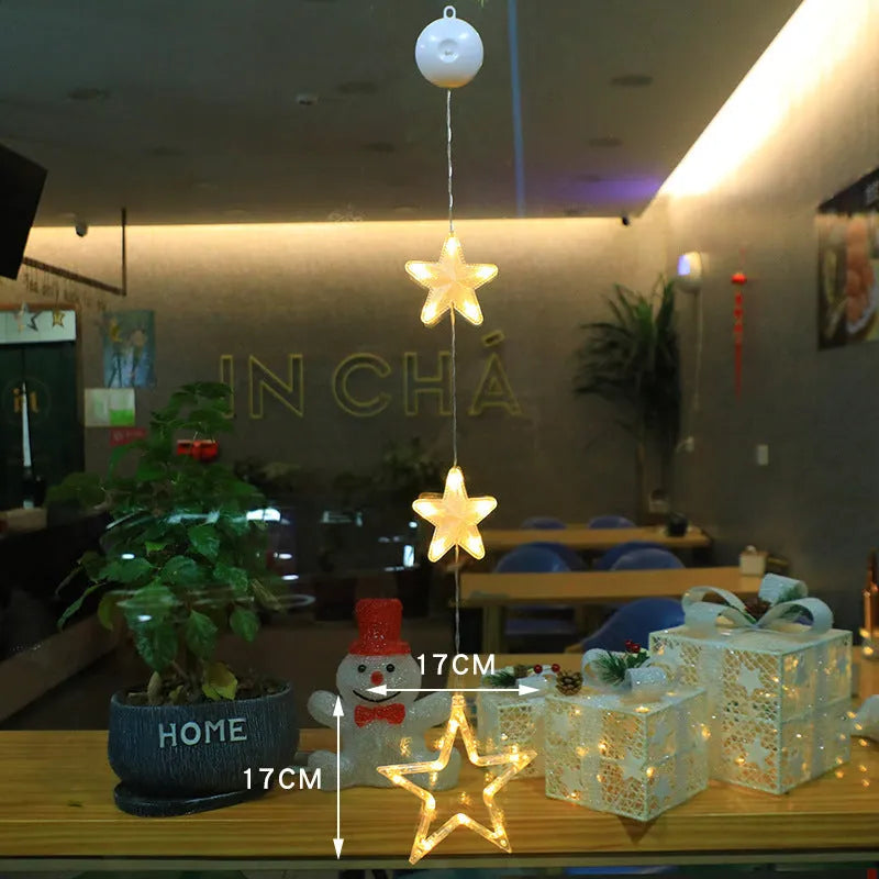 Christmas window lights with star-shaped LED pendants and suction cups for battery-operated festive decoration