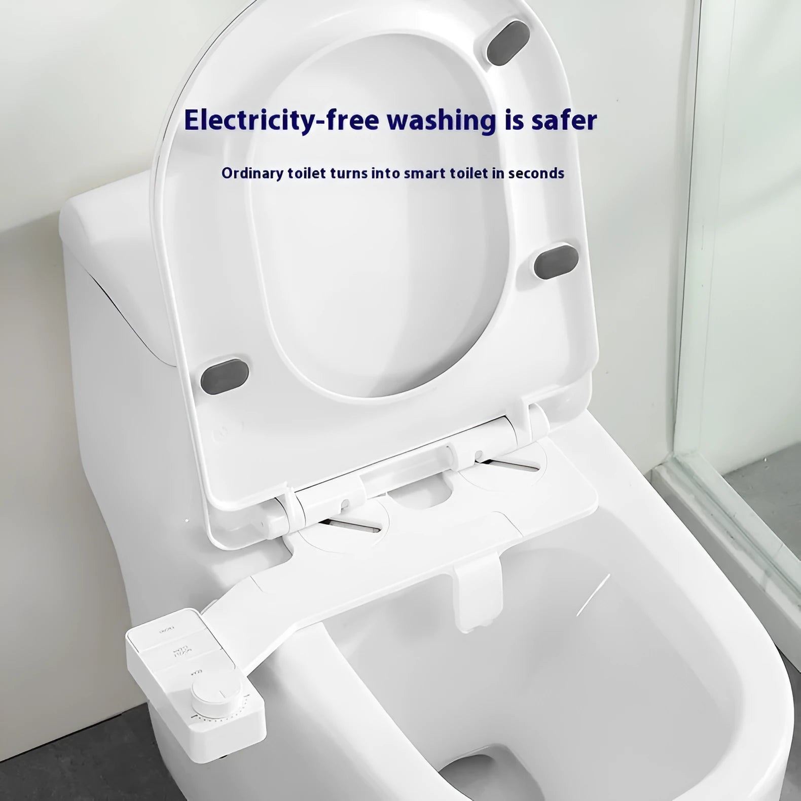 Pure white manual button-operated wash tool with detachable parts and a set of copper and brass tap adapters.