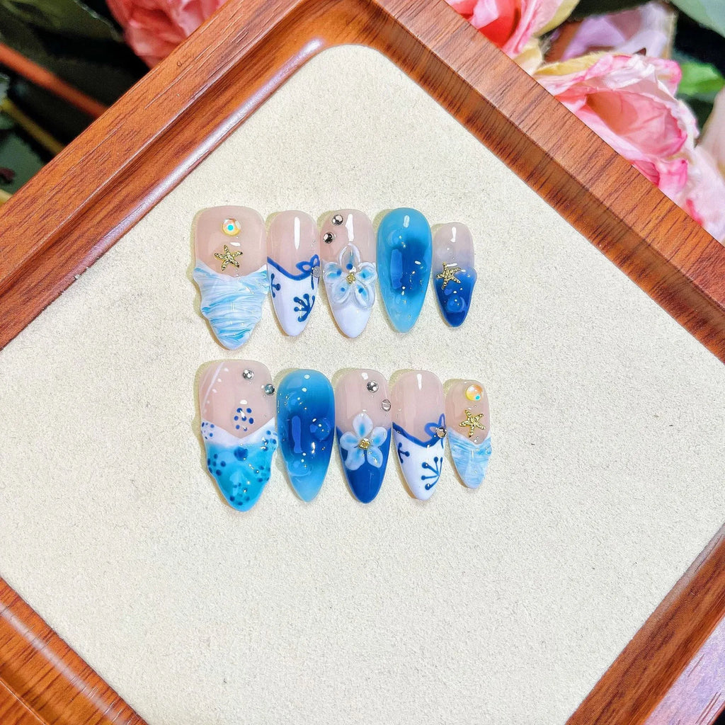 Blue hand-painted carved summer ice transparent false nails set in plastic with sizes XS S M L