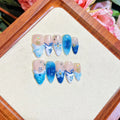 Blue hand-painted carved summer ice transparent false nails set in plastic with sizes XS S M L