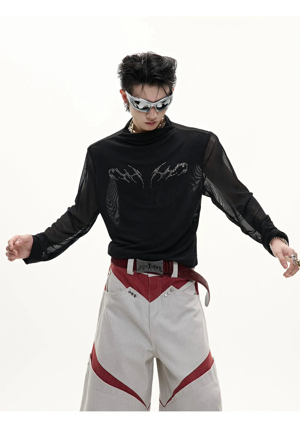 Black and white long sleeve mesh slim fit shirt laid flat, showing mesh fabric texture.