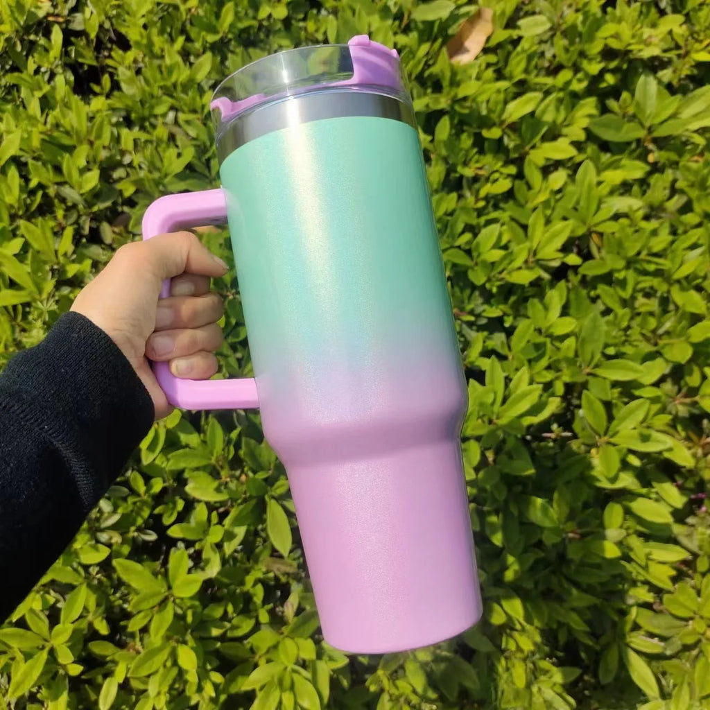 Stainless steel vacuum insulation cup in rainbow gradient colours showing double-layer construction