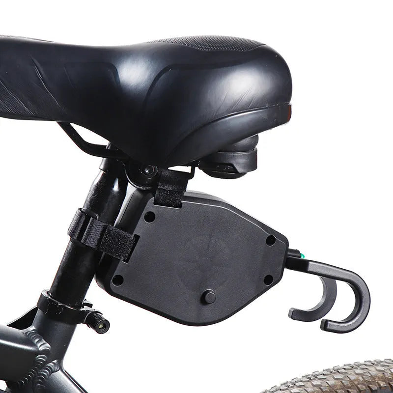 Black plastic and resin bicycle trailer connector rope for towing a child's trailer.