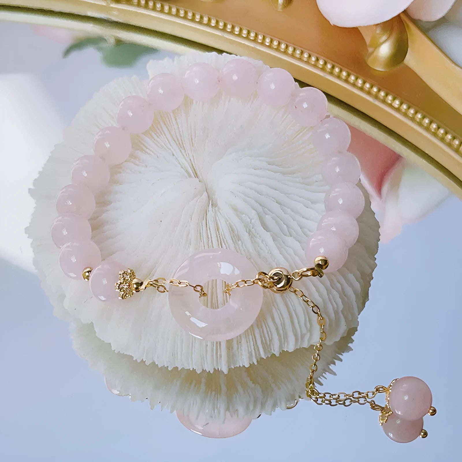 Pink crystal peace buckle bracelet with safety clasp on silver-coloured chain