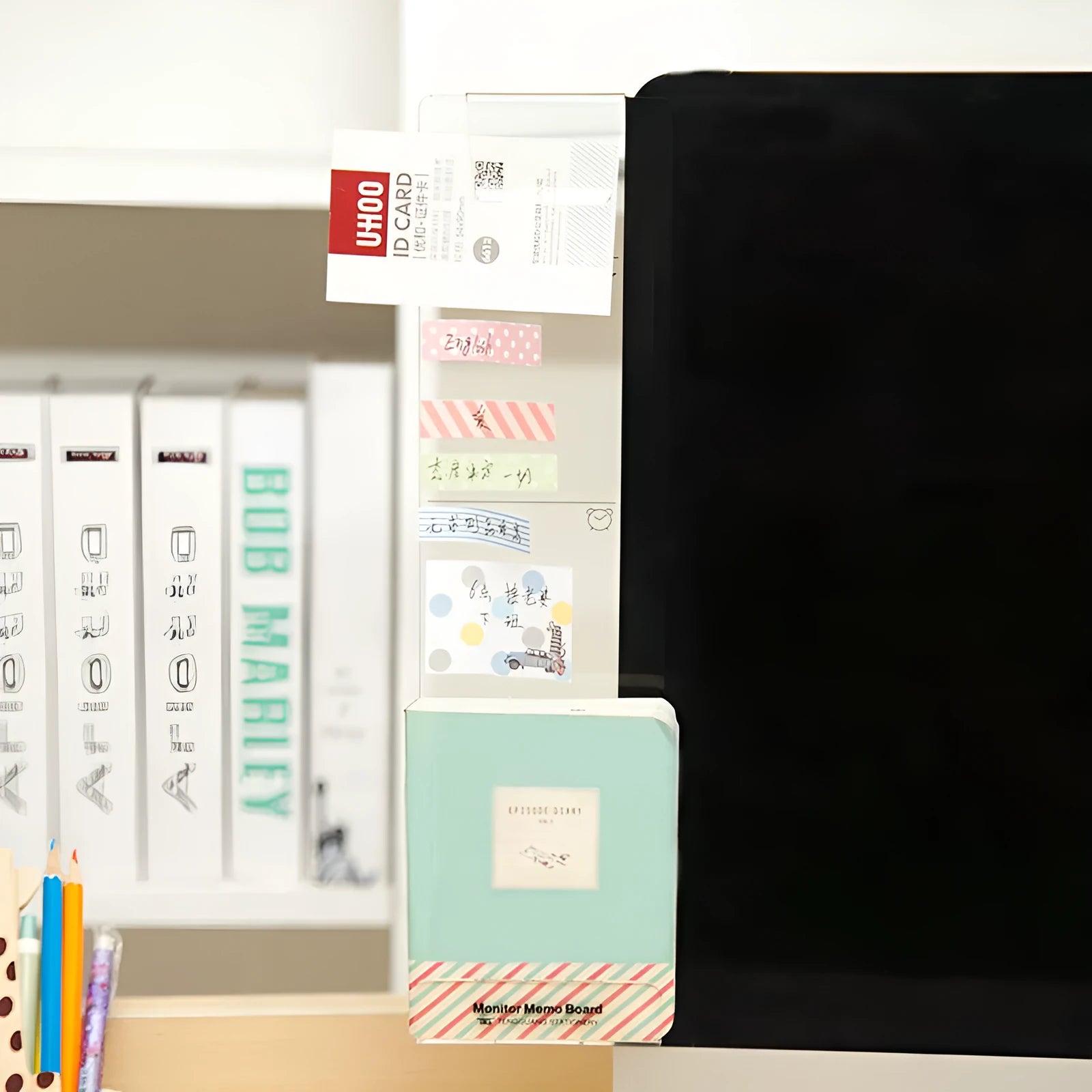 Clear acrylic monitor message memo board with wall suction mount on a computer monitor, left side placement