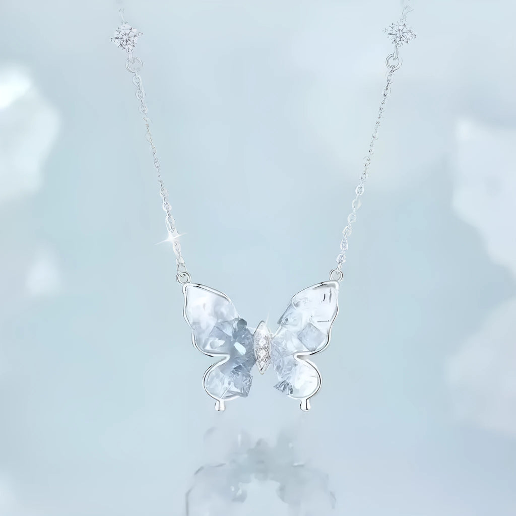 Close-up of a silver Bingyu butterfly pendant necklace on an adjustable O-ring chain.