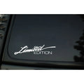 Reflective plastic bumper sticker in black, white, and colourful options showing 16cm by 3.8cm size.