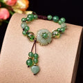 Hand-woven Chinese style bracelet with auspicious patterns and flower design in mixed materials
