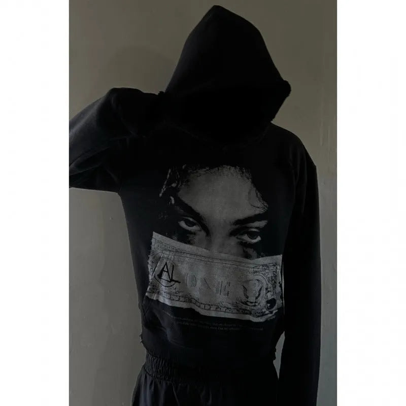 Black women's loose fit hooded sweater with dark printed cartoon pattern design