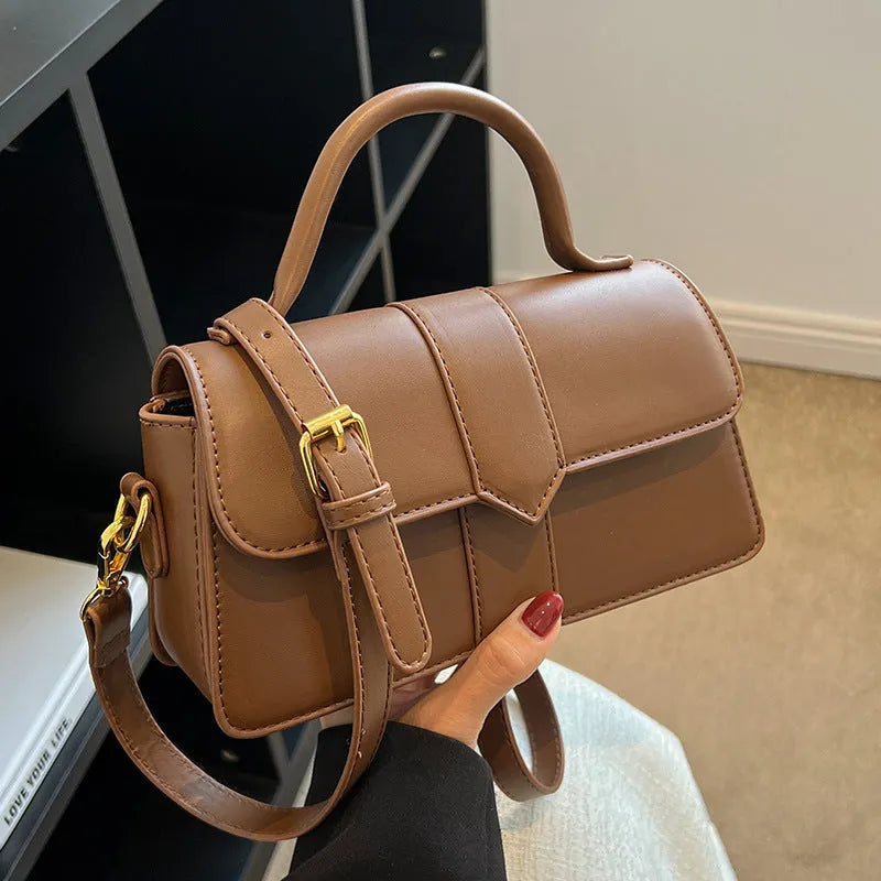 Women's beige PU leather messenger bag showing horizontal square shape and front sandwich pocket
