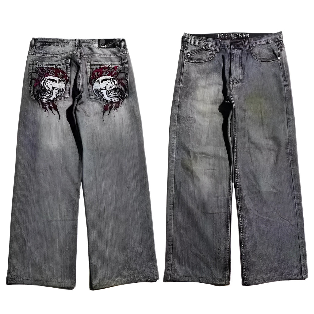 Men's washed grey wide-leg straight jeans on a neutral background.