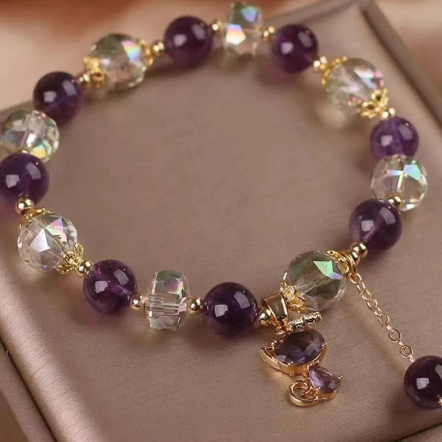 Women's antique style crystal bracelet with purple amethyst fox pendant and five-leaf flower charm.