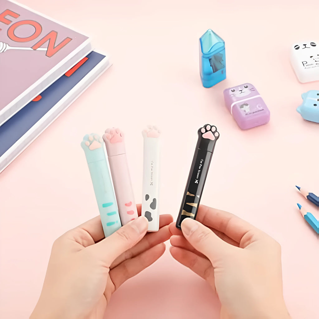 Cat paw mini folding scissors in pink, white, black and blue colours showing compact 8.7 cm size