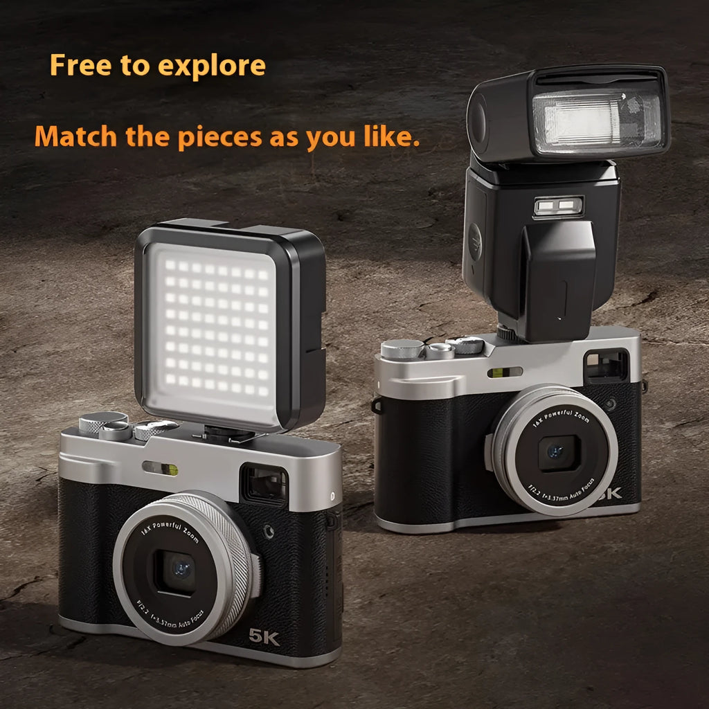 Black 5K HD digital camera with dual lenses and an optical viewfinder on a 2.88-inch screen.