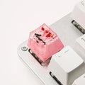 Handcrafted resin keycap with koi fish and pond scenery for Cherry MX keyboard switches.