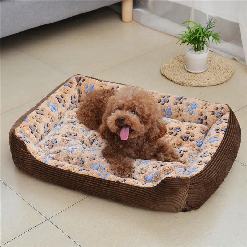 Beige plush sofa-style dog bed mat with raised sides for a small dog, shown next to size chart.