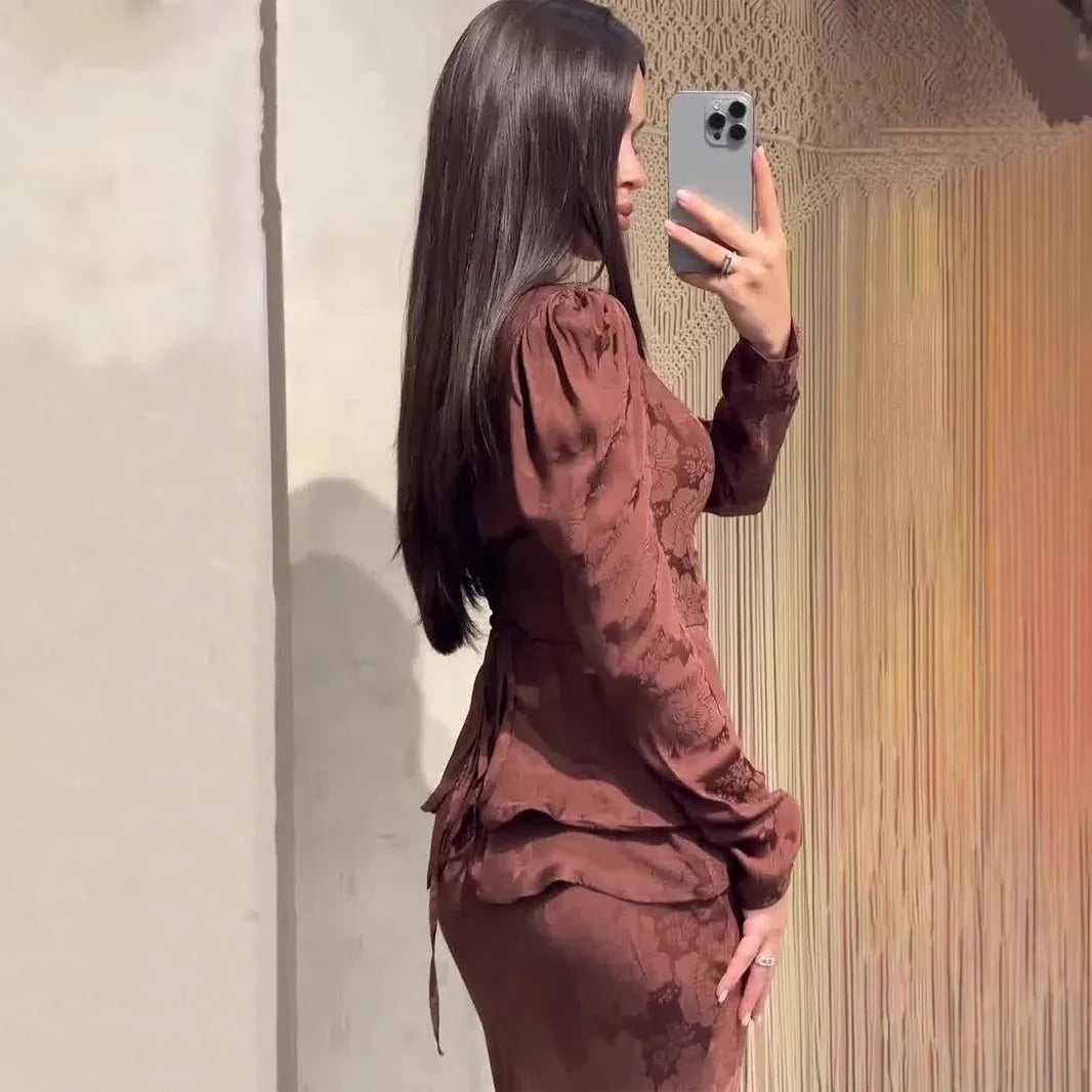 Dark brown women's retro dress with botanical pattern, long sleeves, and a fake two-piece design.