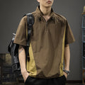 Man modelling a brown half-zip stand collar casual shirt with short sleeves.