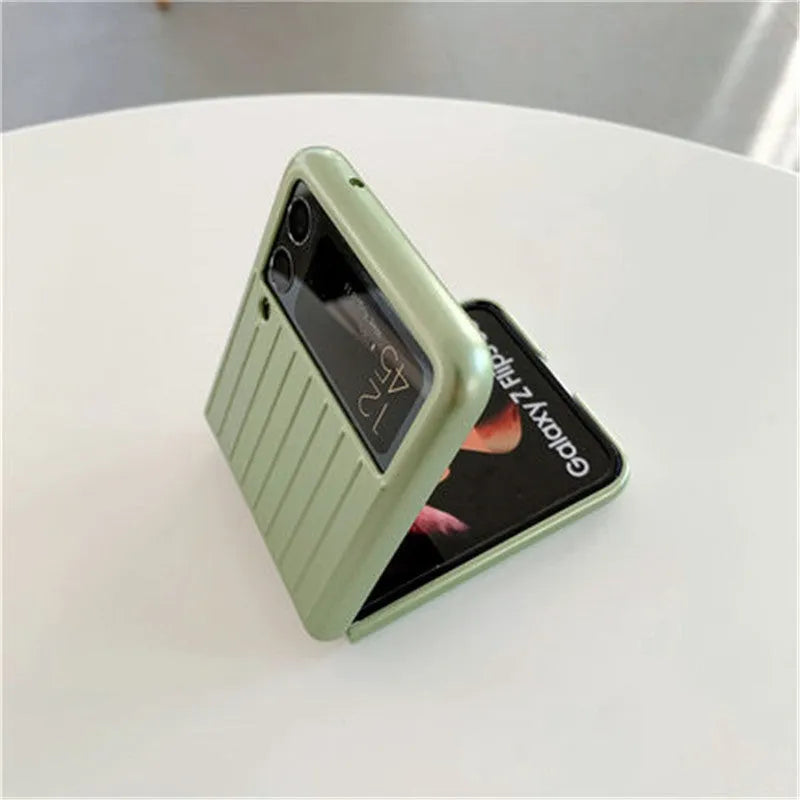 Samsung Z Flip3 folding phone in a slim, solid-colour flip case showing front and back views.