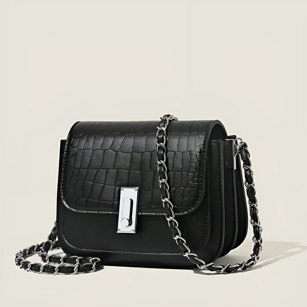 A soft black PU leather women's chain shoulder bag with a square shape and sandwich pocket design.