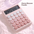 Gradient colour desk calculator in violet, pink, blue, or mint green on a desk.