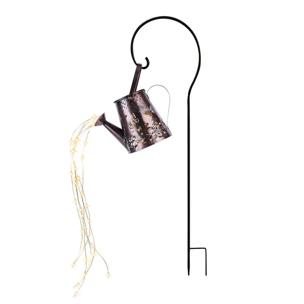 Solar-powered iron garden lamp with a tapered butterfly design emitting warm white LED light.