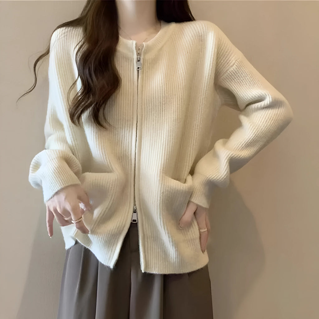 Beige viscose soft wind sweater coat, a long sleeve cardigan laid flat.