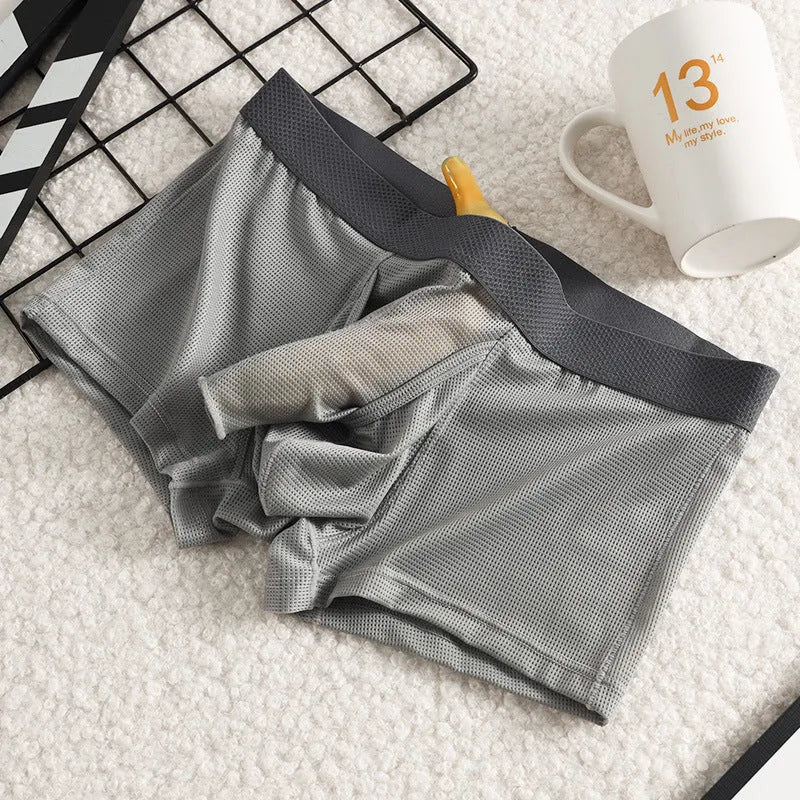 Men's ice silk nylon boxer underwear in black colour showing low-waist design and mesh breathable panels