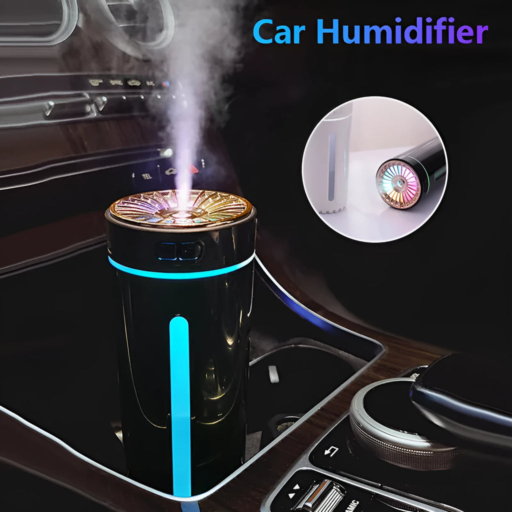 Black portable USB rechargeable humidifier with colourful LED lights on a car cup holder