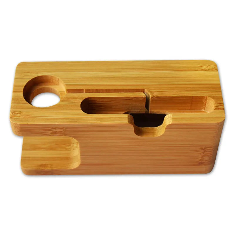 Bamboo phone and watch stand with carved design measuring 149mm wide