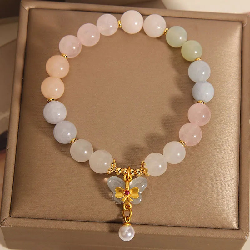 Women's morganite crystal bracelet with colourful butterfly pendant in original jewellery design