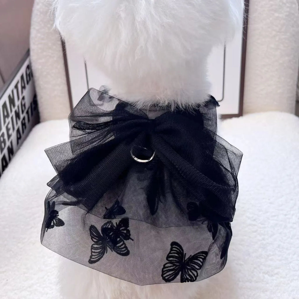 Black gauze princess skirt for a small dog on a mannequin, showing tulle material.