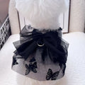 Black gauze princess skirt for a small dog on a mannequin, showing tulle material.
