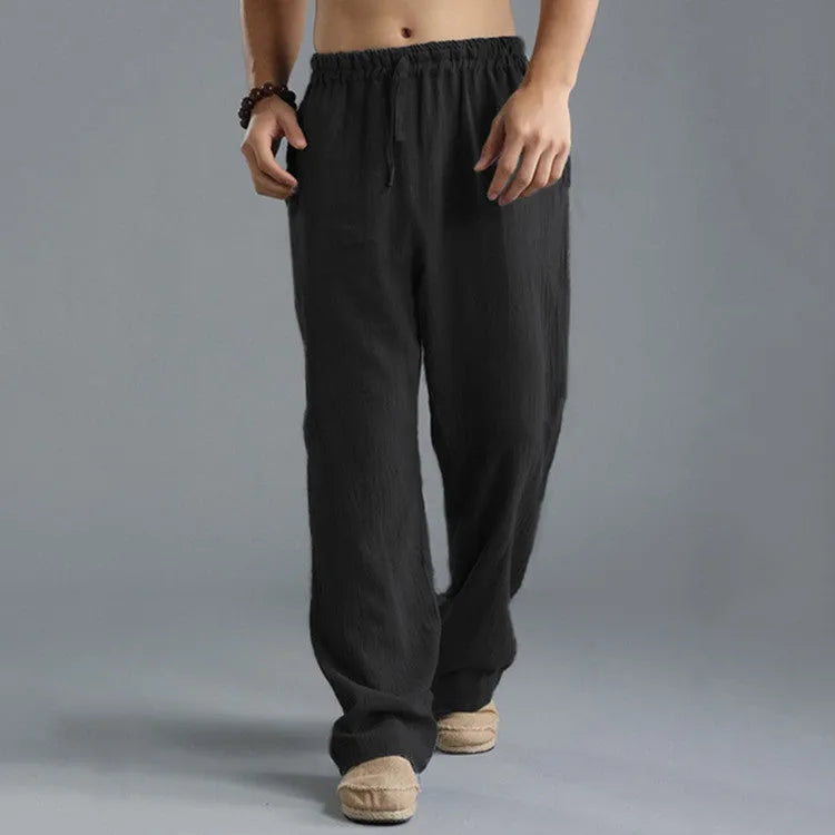 Men's linen loose casual sports pants in khaki, side view, on a hanger