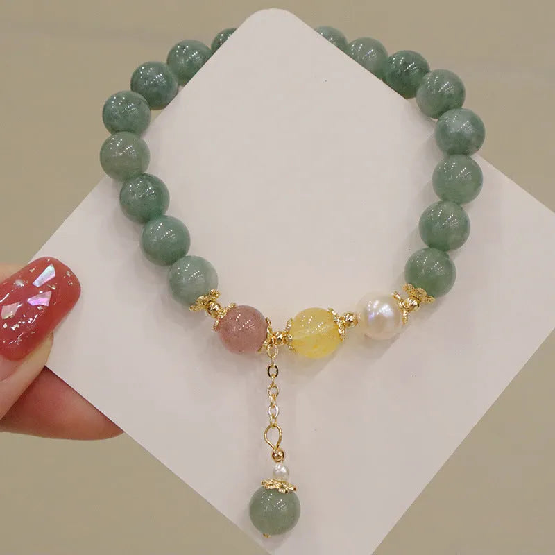Zhen Han style women's bracelet made of Myanmar jade with geometric shapes and bead pearl decoration.