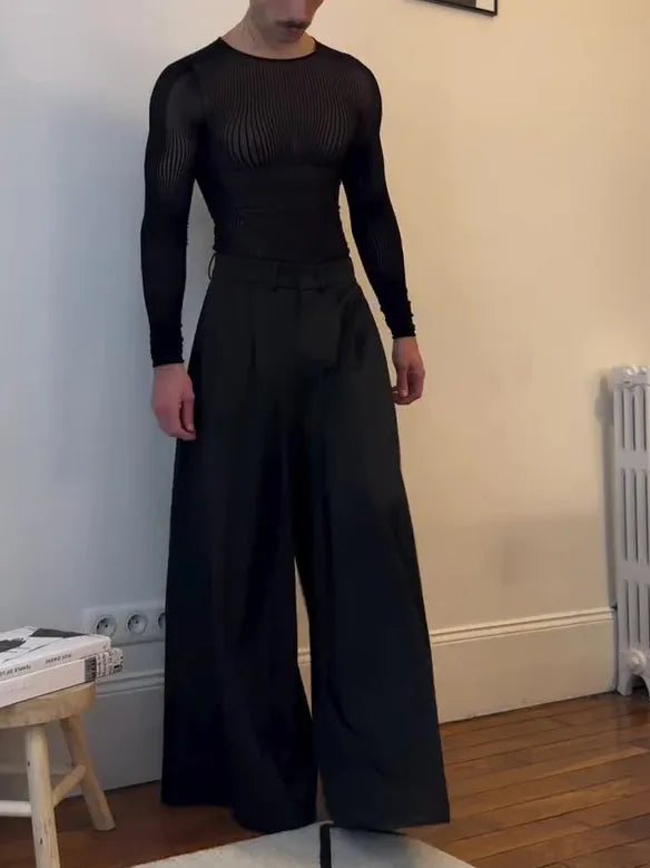 Black mesh long-sleeve top with sheer striped design on a model, regular fit, polyester fabric