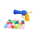 A 30cm long plush ball launcher gun for pets with a selection of soft 3cm yarn balls.