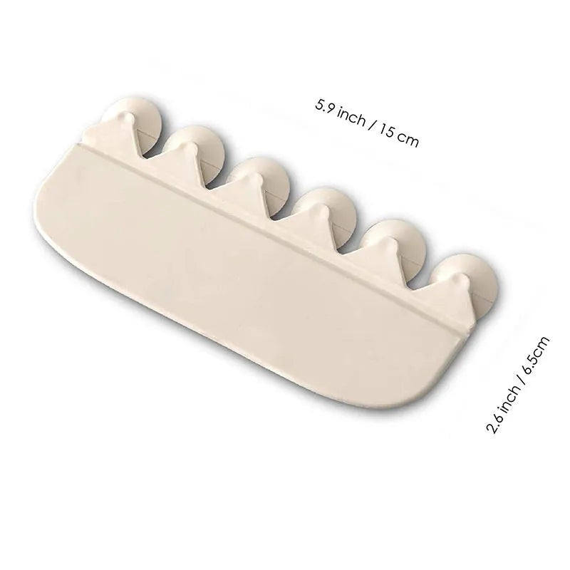 White plastic urine blocking board for toilet training placement on standard toilet bowl