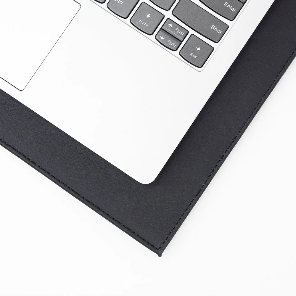 Anti-radiation printing tablet pad in black, gold, blue, and green colour options on a desk.