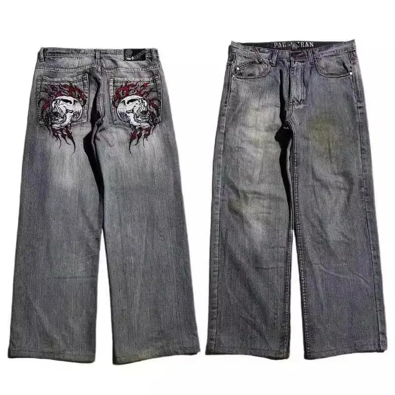 Men's washed grey wide-leg straight jeans on a neutral background.