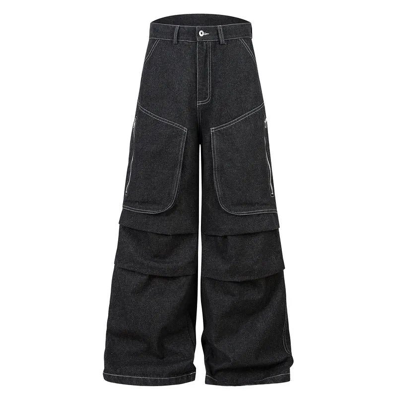 Black pleated work trousers with multiple pockets, mid waist cut, and zip fly in cotton denim fabric