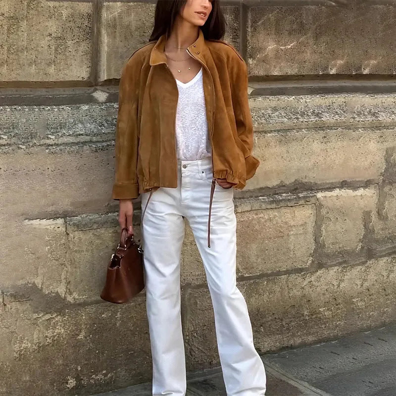 A loose-fitting solid colour long sleeve jacket on a white background.