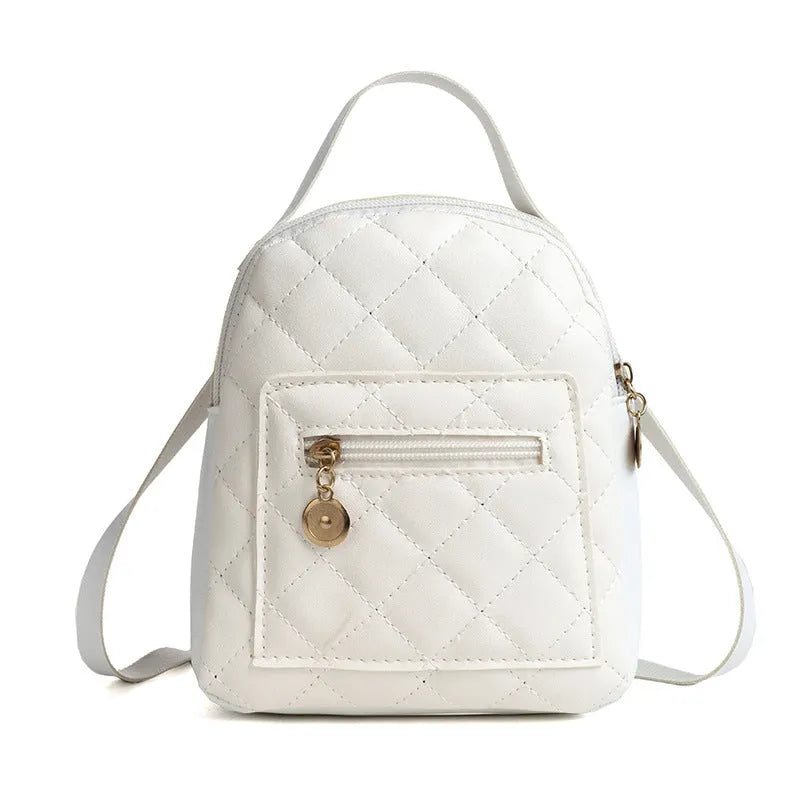 Hard square vertical girls' backpack in PU with embroidery, showing front sandwich pocket and soft carry handle.