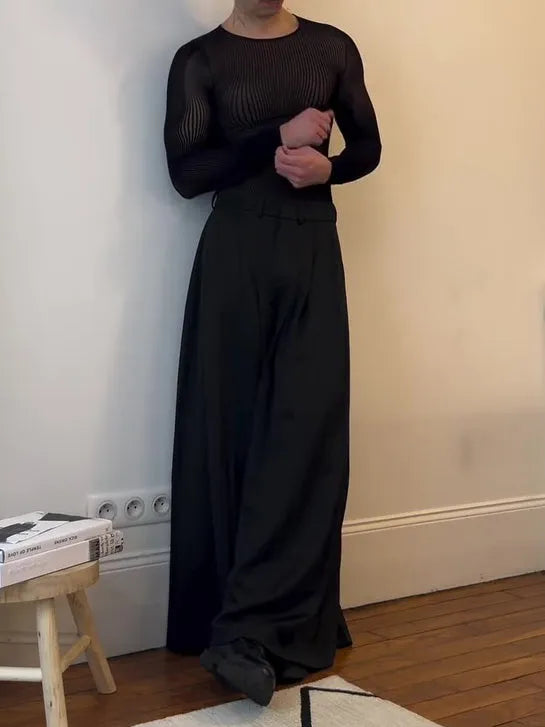 Black mesh long-sleeve top with sheer striped design on a model, regular fit, polyester fabric