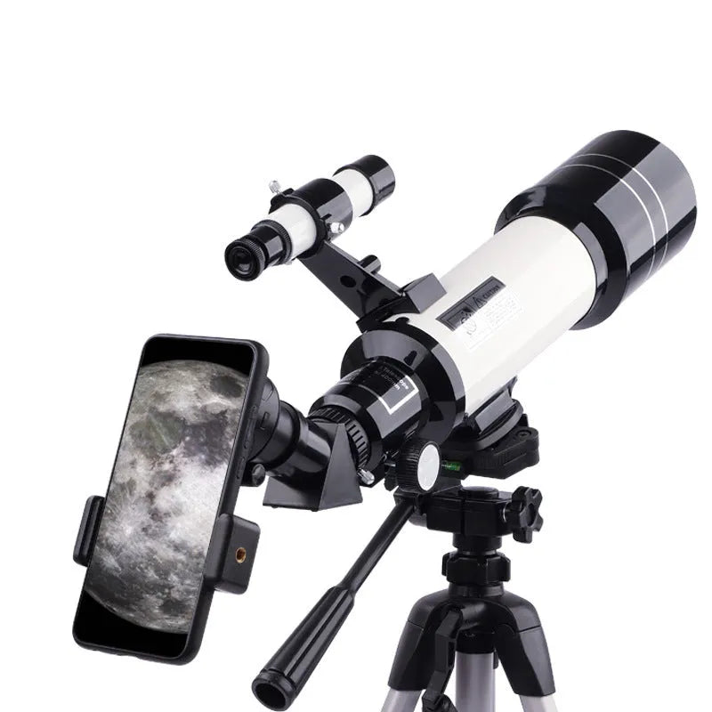 Dark blue children's astronomical telescope with tripod extended, showing monocular design.