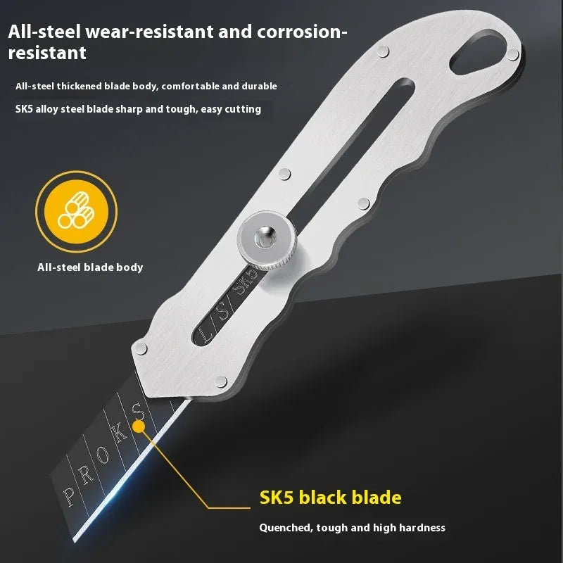 Stainless steel folding art knife with a black blade, shown with a set of long and trapezoidal spare blades.