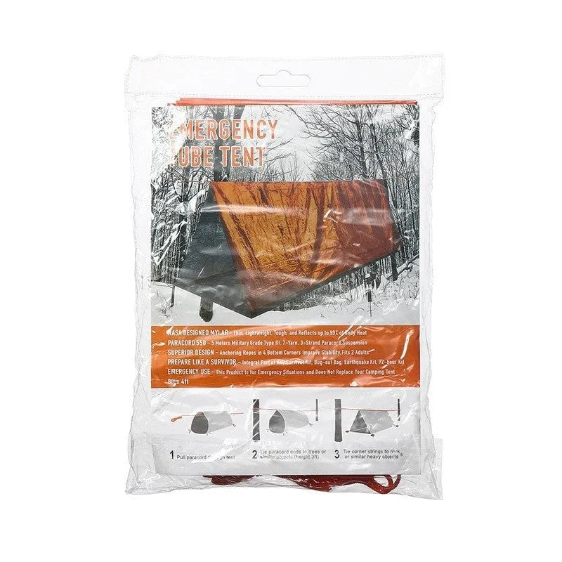 Orange and green emergency tent, sleeping bag, and raincoat kit for outdoor survival.