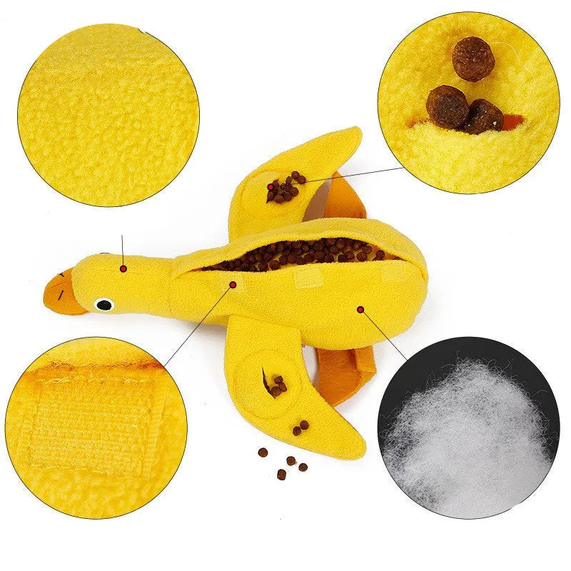 Yellow teddy dog toy with duck sound mechanism and food leak holes for treat dispensing