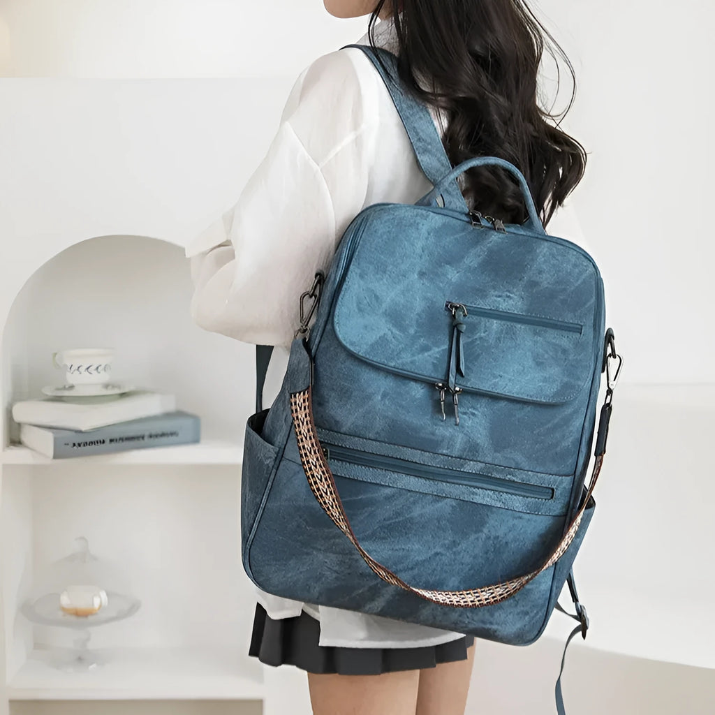 PU leather retro backpack with curved shoulder strap in various colour options