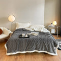 Double bed winter thermal flannel blanket in beige colour showing thickened texture and modern simplicity design
